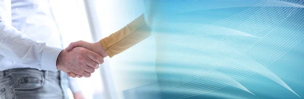 Woman and man shaking hands in office; panoramic banner — ストック写真