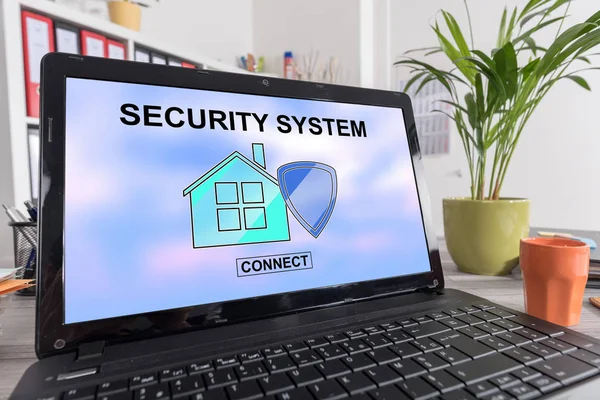 Home security system concept on a laptop