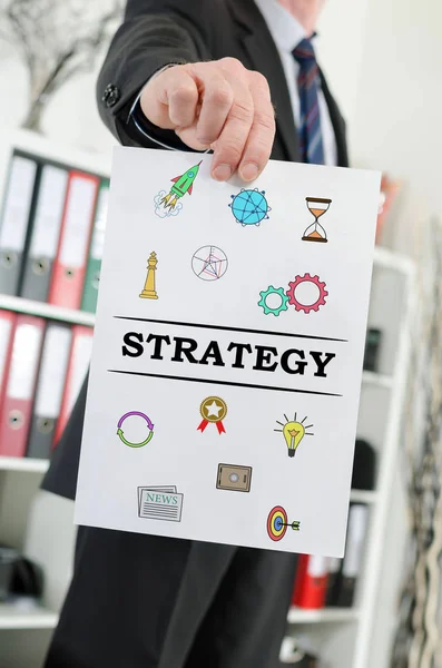 Strategy concept shown by a businessman — Stock Photo, Image