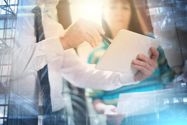 Manager working with executive assistant; multiple exposure — Stock Photo, Image