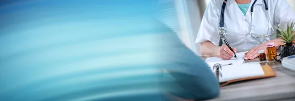 Female Doctor Writing Prescription Her Patient Medical Office Panoramic Banner — Stock Photo, Image