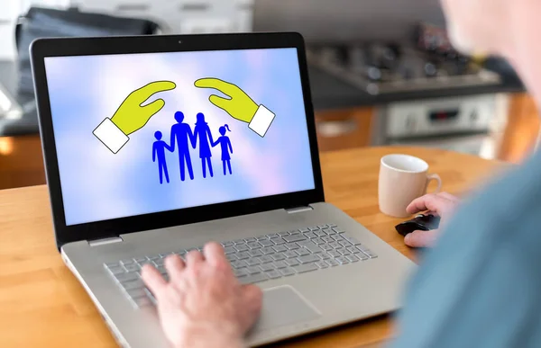 Man Using Laptop Family Protection Concept Screen — Stock Photo, Image