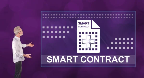 Businessman showing a smart contract concept on a wall screen