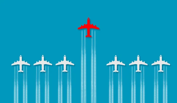 Red plane flying in the lead. Concept of leadership and success