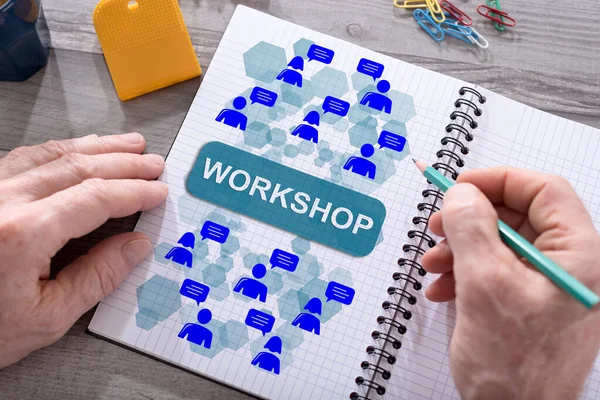 Workshop Concept Getekend Een Notitieblok Geplaatst Een Bureau — Stockfoto