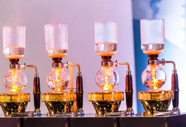 Siphon Coffee or Vacuum Coffee is full immersion tasteful, Blended smell and taste ofroasted coffee with direct contact boiled water and show boiling water, stunning vacuum process by Beam heater.