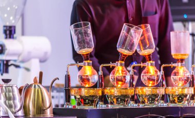 Tesisler kahve veya vakum kahve tam daldırma zevkli ve kaynar su, Vakum işlem ışın ısıtıcı tarafından çarpıcı resim gösterisi olduğunu.