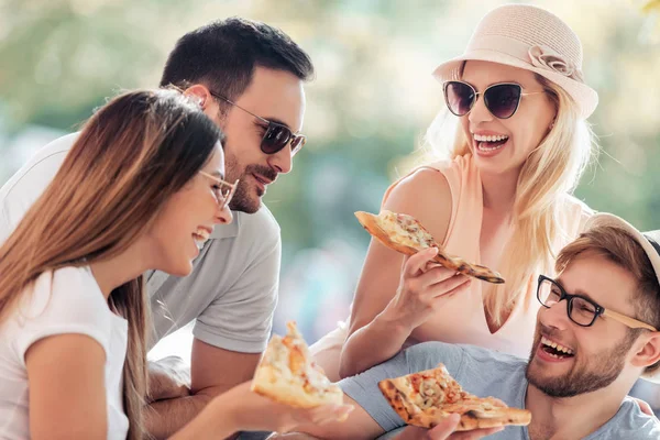 Close Four Young Cheerful People Eating Pizza Enjoying Together — Stock Photo, Image