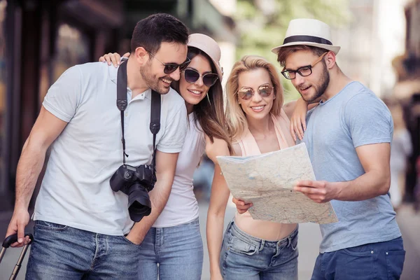 Happy Young Friends Use Map Determine Direction Point Way Wish — Stock Photo, Image
