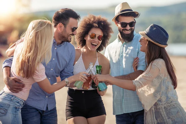 Happy young people having party on the beach.Summer holidays,people,friendship,fun and  vacation concept.