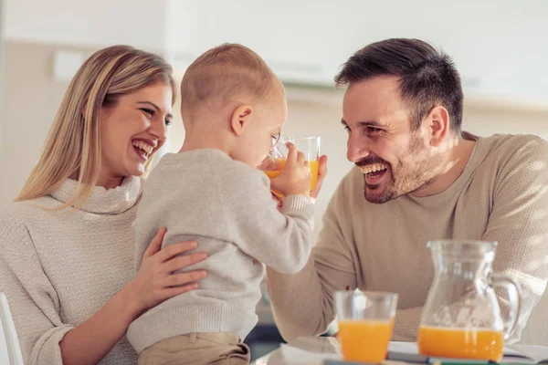 Cheerful Young Family Making Orange Juice — Stock Photo, Image