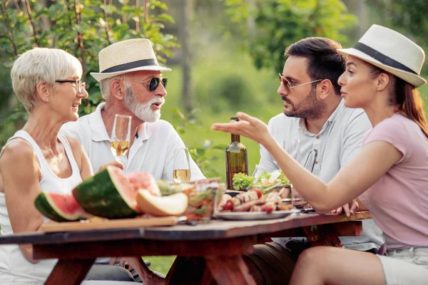 Happy Family Having Picnic Park Sunny Day Enjoying Together — стоковое фото