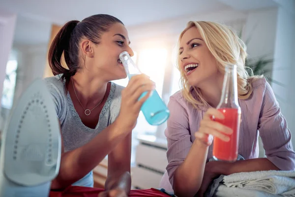 Best Friends Ironing Clothes Home Having Fun — Stock Photo, Image