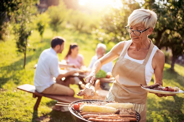 Family Having Barbecue Garden Eating Having Fun Together — Stock Photo, Image