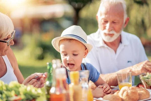 Family Time Grandfather Grandmother Grandson Having Lunch Summer Garden — Stock Photo, Image