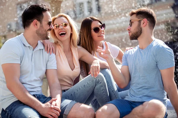 Cheerful Best Friends Sitting Front Fountain Having Fun — Stock Photo, Image