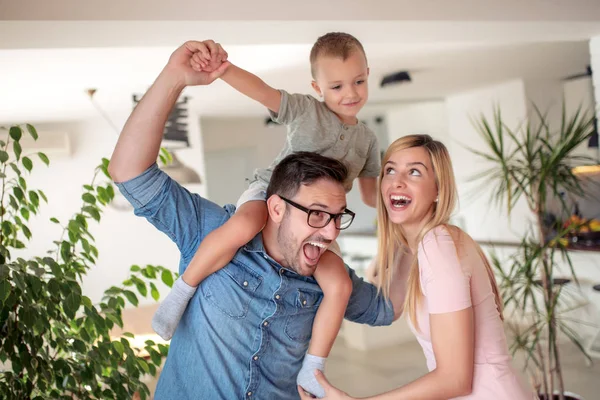 Happy Young Parents Playing Home Spending Time Together — Stock Photo, Image