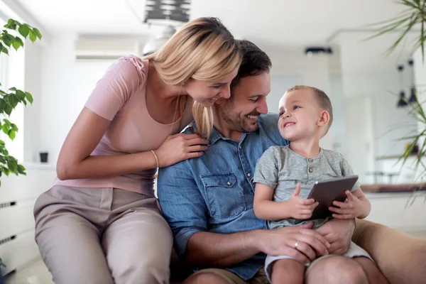 Happy Family Spending Time Home Looking Something Tablet — Stock Photo, Image