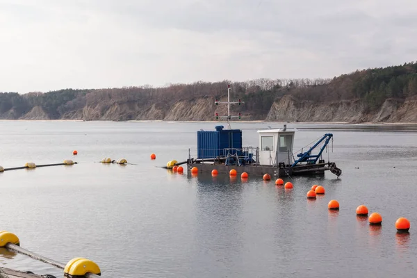 Kum tarak tekne denize yakın
