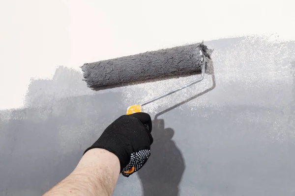 Renovation Interior Man Hand Holds Paint Roller Painting Wall Grey — Stock Photo, Image