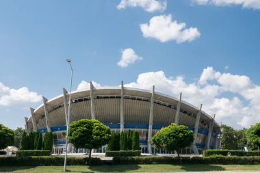 VARNA, BULGARIA - JULY 18, 2018: View of the Palace of sports in Varna, Bulgaria. Palace of Culture and Sports is an indoor complex for culture and sport located in Varna, Bulgaria. It was completed in 1968. clipart