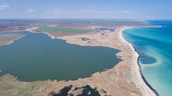 The Wild Bulgaria. Aerial wiev of Durankulak Lake and Black sea coast. Northeastern Bulgaria. There is more than 260 species of rare and endangered plants and animals. — Stock Photo, Image