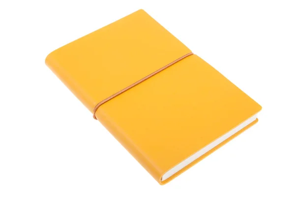 Žlutá barevná titulní kniha s poznámkou je izolovaná. Kniha náčrt. Zápisník na žlutém koženém obalu — Stock fotografie