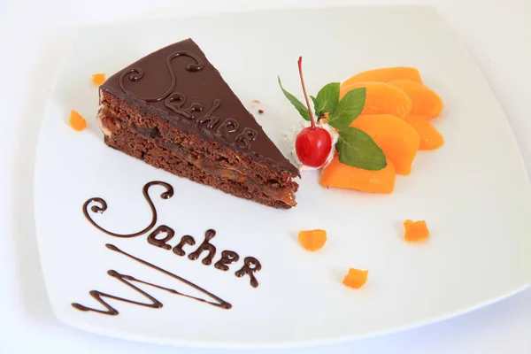 Fresh chocolate sacher cake with decoration — Stock Photo, Image