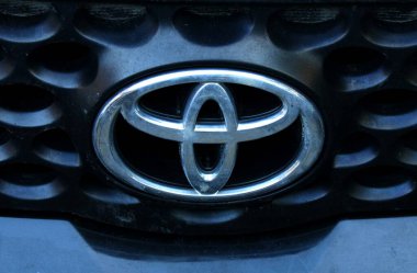Close-up Of the Toyota Logo. The logo of the car. clipart