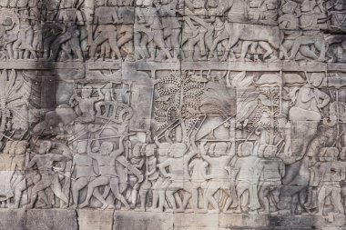 Siem Reap - 04 Ocak 2015: Tarihi kalıntıları ile süslü taş oymalar Bayon Tapınağı Angkor karmaşık üzerinde 04 Ocak 2015 Siem Reap, Kamboçya'da.