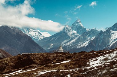 Beautifull Himalaya, Ama Dablam landscape from the footpath on the Everest Base Camp trek in the Himalaya, Nepal. Himalaya landscape and mountain views. clipart