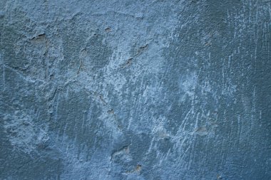 Mavi boyalı desenli bir duvar. Eski bina. Güzel soyut arkaplan.