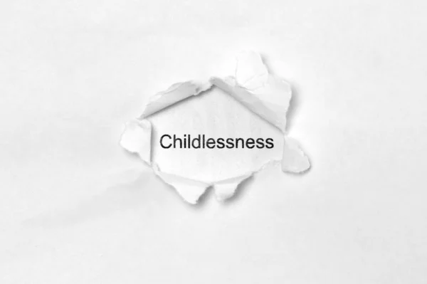 Word Childlessness White Isolated Background Inscription Wound Hole Paper Stock — Stock Photo, Image