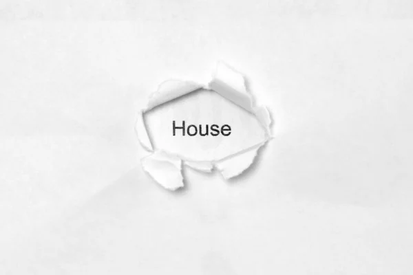 Word House Białym Tle Napis Przez Dziurę Ranie Papierze Fotografia — Zdjęcie stockowe