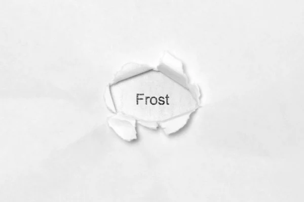 Word Frost fehér elszigetelt háttér keresztül seb lyuk a papíron. — Stock Fotó