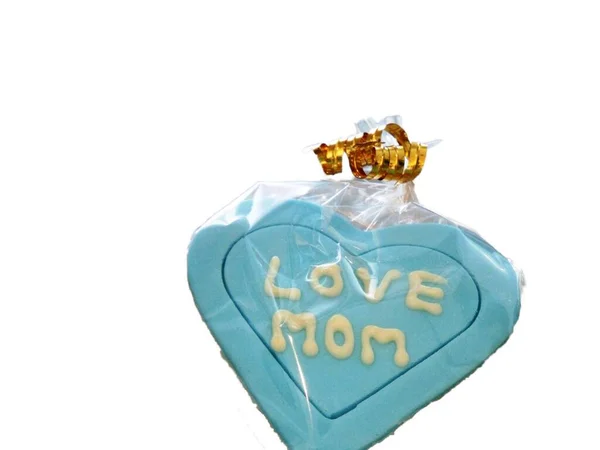 I love you Mom labeled gingerbread petal neatly wrapped in white background — Stock Photo, Image