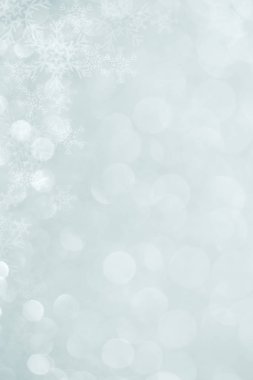 Mavi Noel arkaplanı ve kar taneleri 