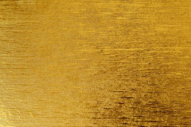 Parlak sarı yaprak altın folyo dokulu arka plan herhangi bir tasarım için uygun