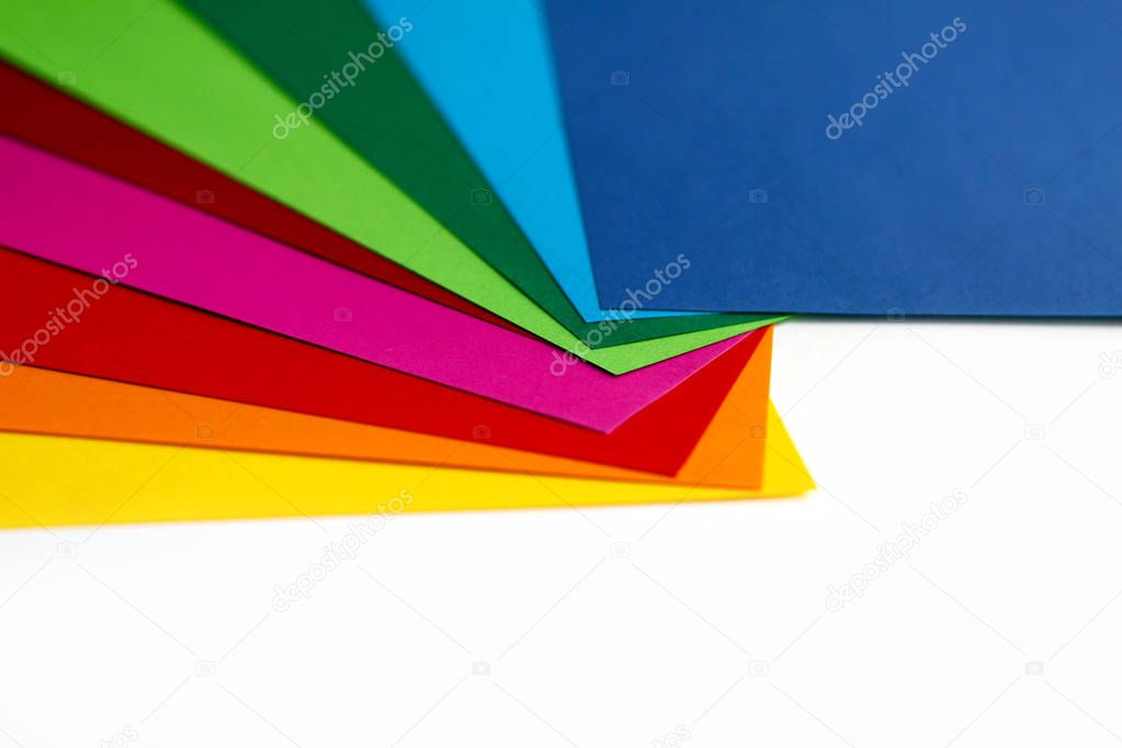 Geometric composition of several bright color sheets of paper. Suitable background for your design, presentation, brochure, web, banner, catalog, poster, book, magazine 