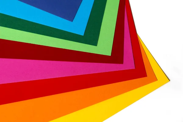 Geometrische samenstelling van verschillende heldere kleuren vellen papier. Geschikte achtergrond voor uw ontwerp, presentatie, brochure, Web, banner, catalogus, poster, boek, tijdschrift — Stockfoto