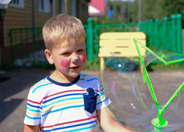 Cute Little Boy Face Painting Caucasian Boy Blowing Soap Bubbles — Stock Photo, Image