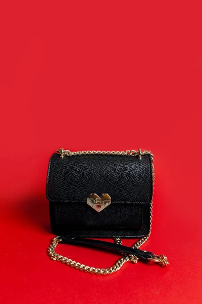 a stylish and black purse. Accessory for women.