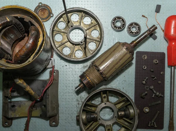 Old electric motor in disassembled condition. Electric motor details