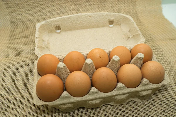 chicken eggs in a cardboard box. Concept, selective focus. Rustic style