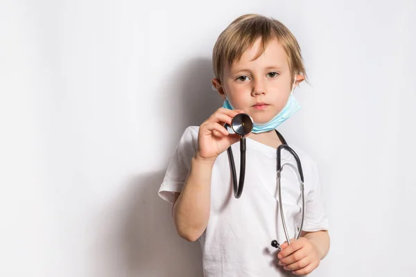 Cute Little Girl in medical mask with stethoscope isolated banner — Stock Photo, Image