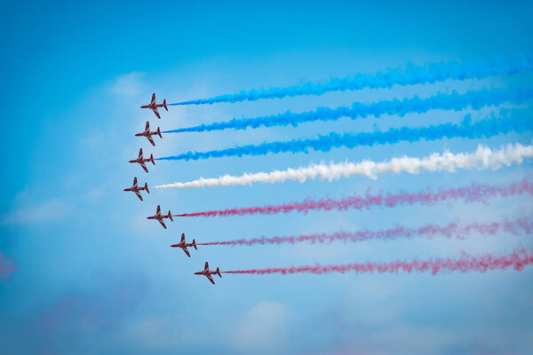 aero show at clear blue sky during daytime