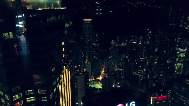 傾斜映画色の空撮で香港セントラル地区のシティ ナイト — ストック動画