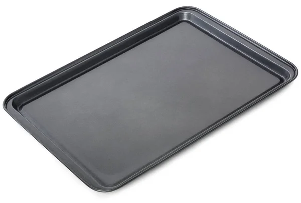 长方形黑色烘烤盘在烤箱 被隔绝在白色背景下 — 图库照片