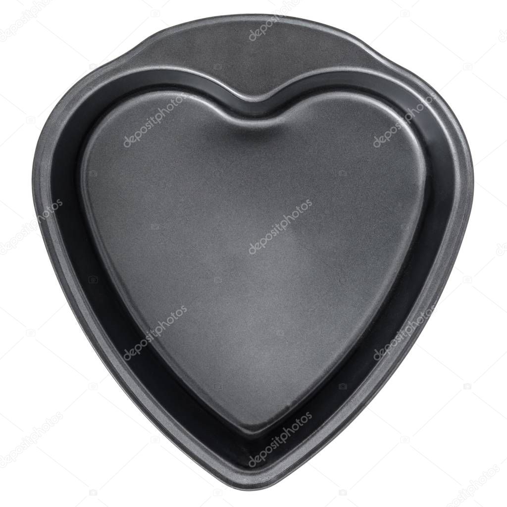 metal heart shaped baking dish isolated on white background