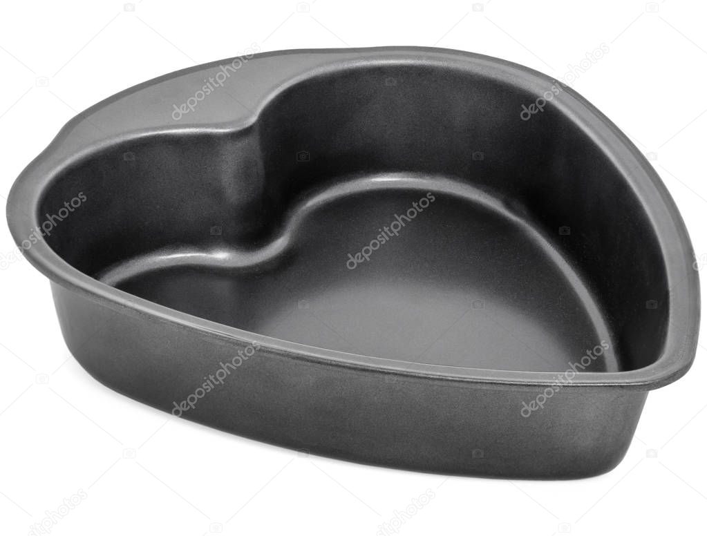 metal heart shaped baking dish isolated on white background
